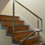 Stainless steel staircase railing with cable rail, private residence