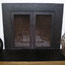 Fireplace surround with doors, private residence